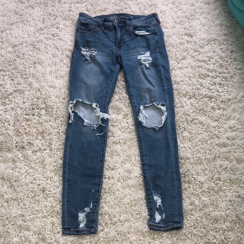 Ripped medium washed skinny jeans